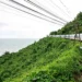 A train meandering slowly through the mountains